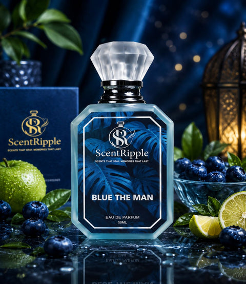 ScentRipple Blue The Man eau de parfum bottle with blueberries, green apples, and a decorative lantern in the background.