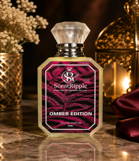 ScentRipple Ombre Edition perfume bottle on a reflective surface with decorative background
